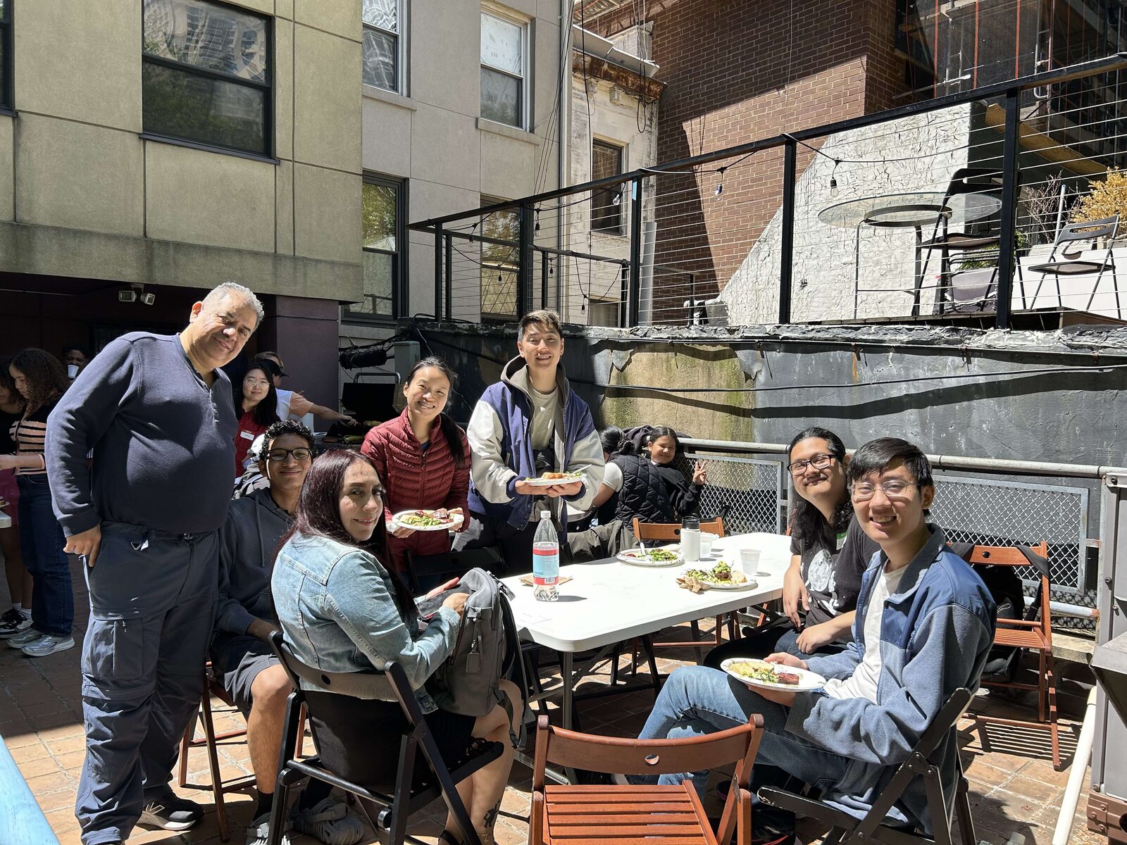 Vine community sharing a rooftop meal
